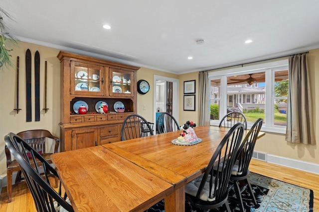 160 Disbrow St, Stratford, CT 06614 - dining space with light wood-style flooring, crown molding, recessed lighting, and a ceiling fan