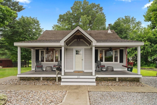 160 Disbrow St, Stratford, CT 06614 - bungalow-style home with a ceiling fan, a porch, a front lawn, and a shingled roof