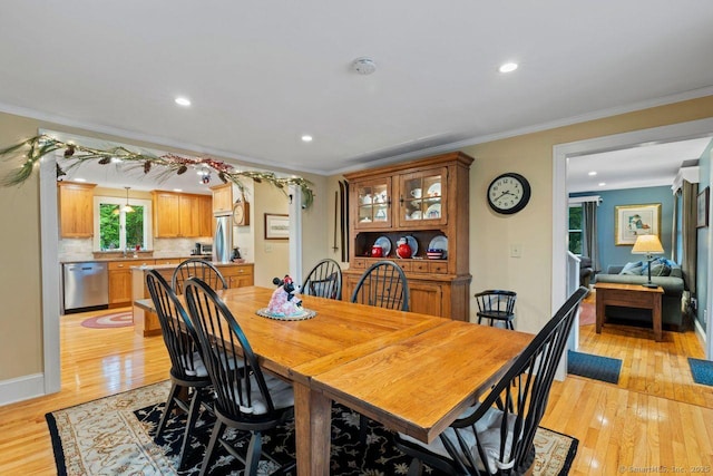 160 Disbrow St, Stratford, CT 06614 - dining area featuring light wood-type flooring, ornamental molding, and recessed lighting