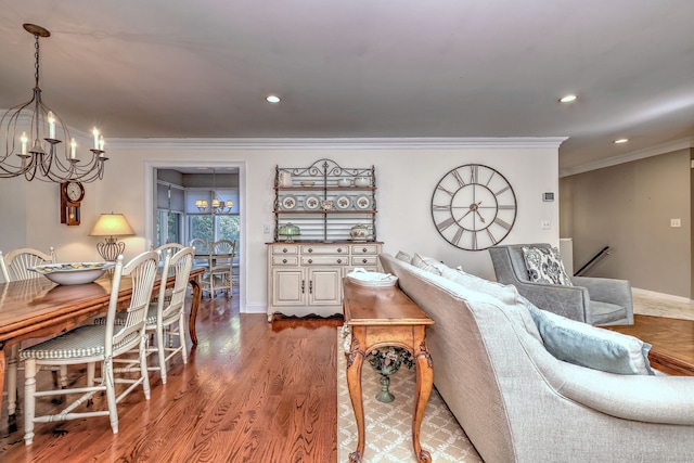 690 Forest Rd Unit 394, West Haven, CT 06516 - living area featuring a chandelier, crown molding, wood finished floors, and recessed lighting