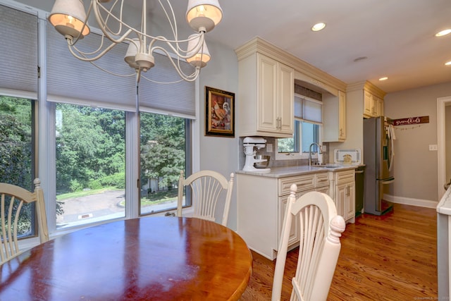 690 Forest Rd Unit 394, West Haven, CT 06516 - dining room with a chandelier, light wood-style floors, and recessed lighting