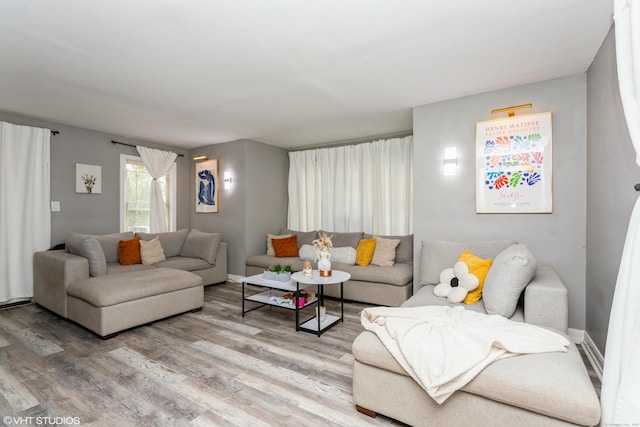 26 Trowbridge St, Waterbury, CT 06710 - living room with wood finished floors and baseboards