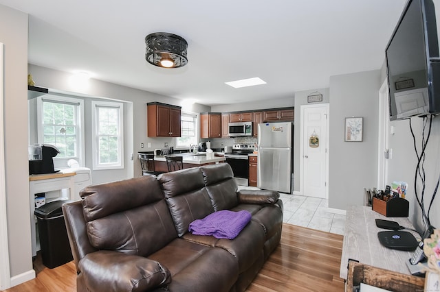 31 Bristol St, Thomaston, CT 06787 - living area featuring light wood finished floors