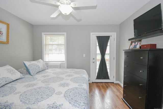 31 Bristol St, Thomaston, CT 06787 - bedroom with light wood finished floors, access to exterior, ceiling fan, and a wall unit AC