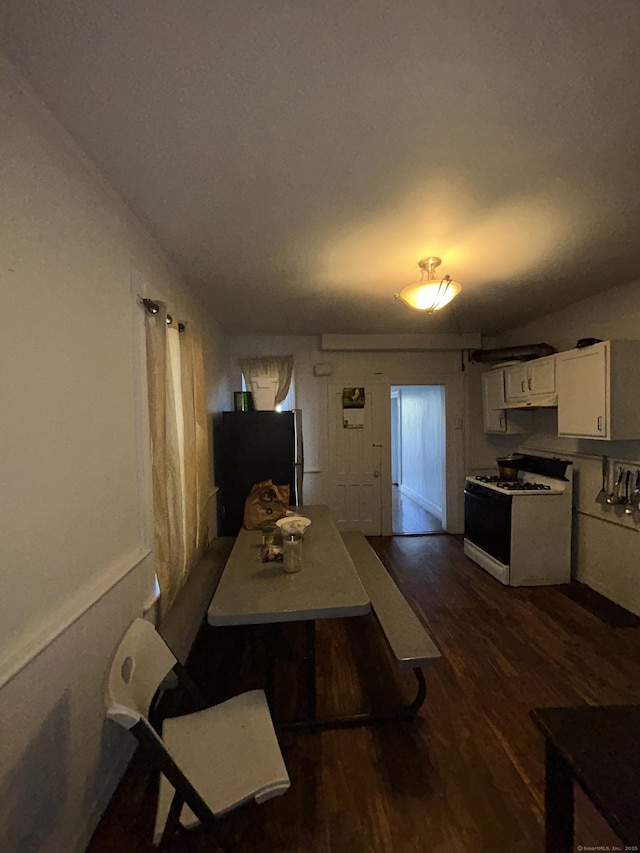 595 William St, Bridgeport, CT 06608 - dining room featuring dark wood-style flooring