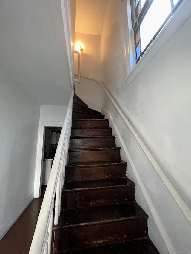 595 William St, Bridgeport, CT 06608 - stairs featuring wood finished floors and baseboards