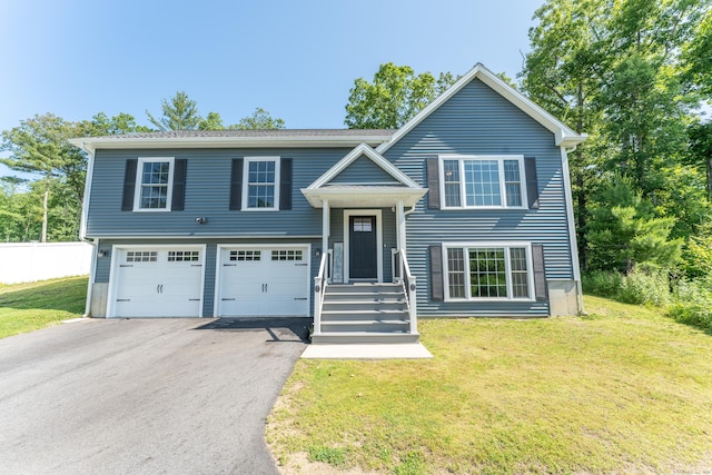 46 Airport Rd, Killingly, CT 06239 - raised ranch featuring asphalt driveway and a garage