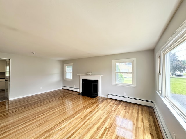 462 Halfway House Rd, Windsor Locks, CT 06096 - unfurnished living room featuring a baseboard radiator, wood finished floors, a fireplace with flush hearth, and baseboard heating