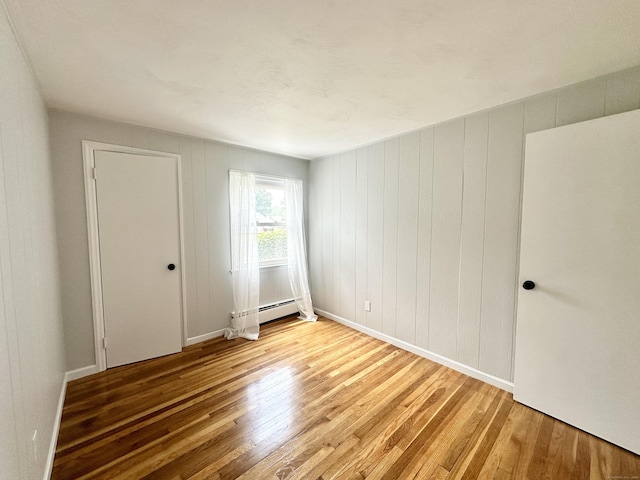 462 Halfway House Rd, Windsor Locks, CT 06096 - unfurnished room featuring wood finished floors and baseboard heating