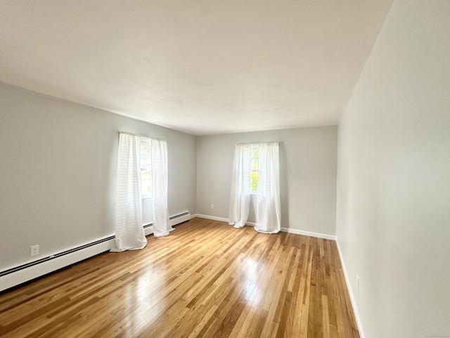 462 Halfway House Rd, Windsor Locks, CT 06096 - spare room with a baseboard radiator and light wood-style flooring