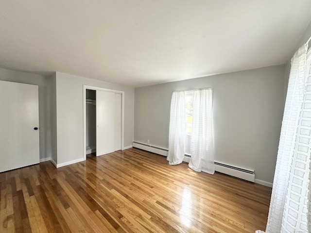 462 Halfway House Rd, Windsor Locks, CT 06096 - unfurnished bedroom featuring wood finished floors and a closet