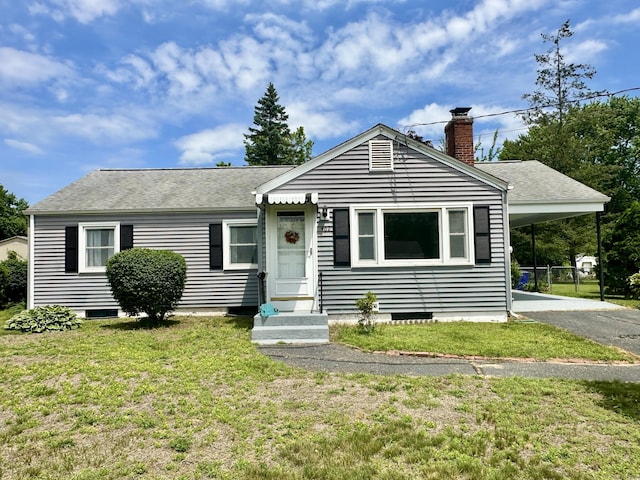 462 Halfway House Rd, Windsor Locks, CT 06096 - view of front facade with a front lawn, a carport, driveway, a chimney, and a shingled roof