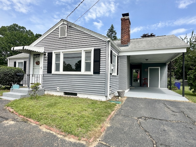 462 Halfway House Rd, Windsor Locks, CT 06096 - bungalow with a chimney, driveway, and a front yard