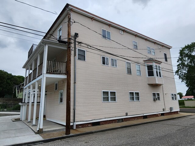 18 Hunters Ave, Norwich, CT 06380 - view of side of home with a balcony