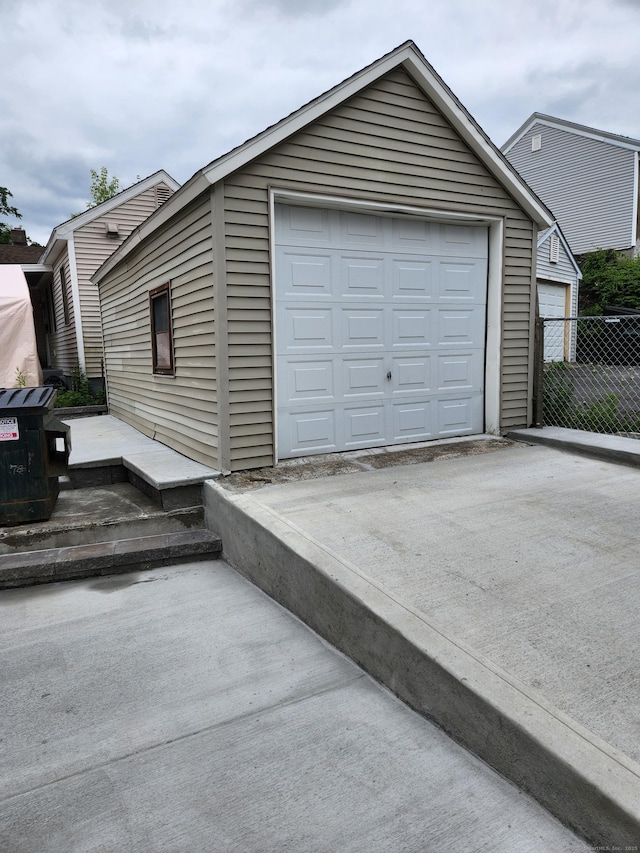 18 Hunters Ave, Norwich, CT 06380 - garage with concrete driveway