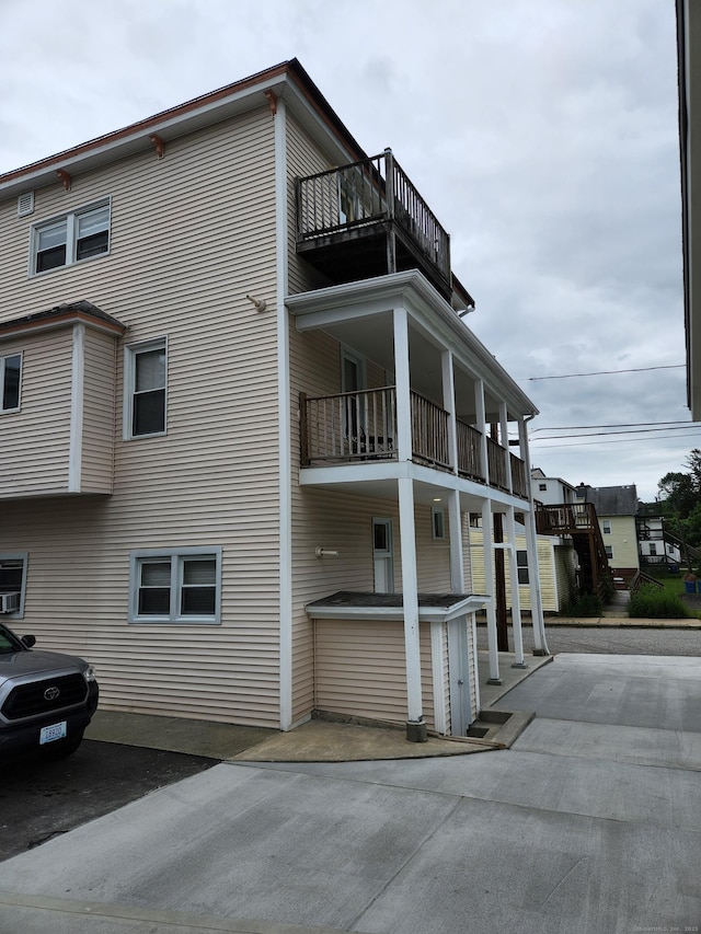 18 Hunters Ave, Norwich, CT 06380 - view of side of home featuring a balcony