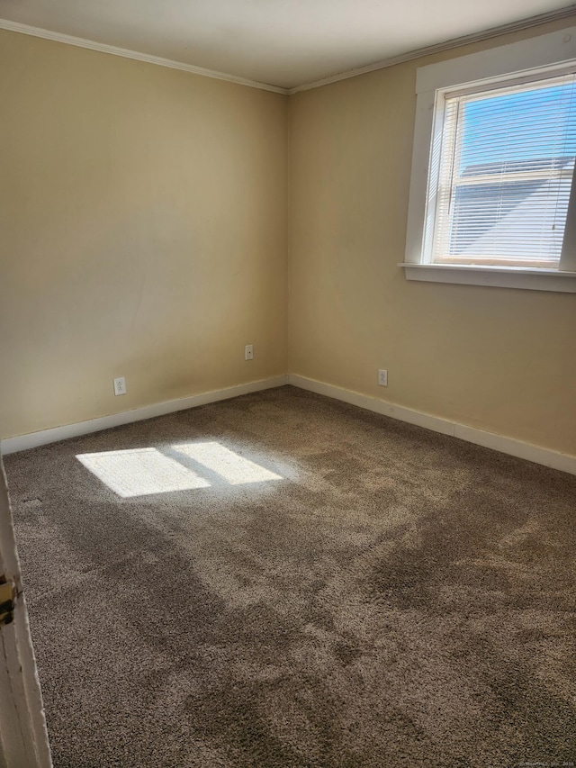 18 Hunters Ave, Norwich, CT 06380 - spare room with crown molding and carpet flooring