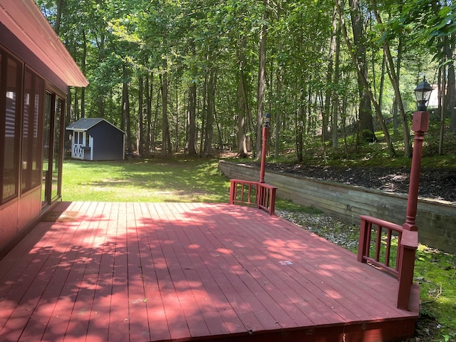 46 Twin Oak Farm Rd, Wallingford, CT 06492 - wooden deck with a storage unit, a lawn, and a view of trees