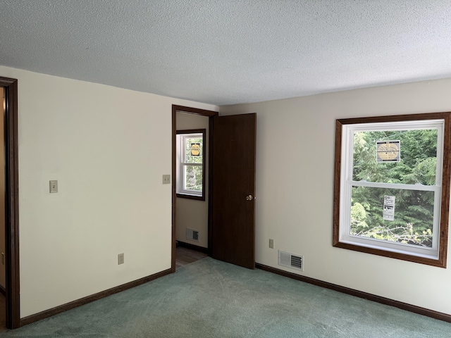 394 Merrow Rd, Coventry, CT 06238 - empty room featuring carpet and a textured ceiling