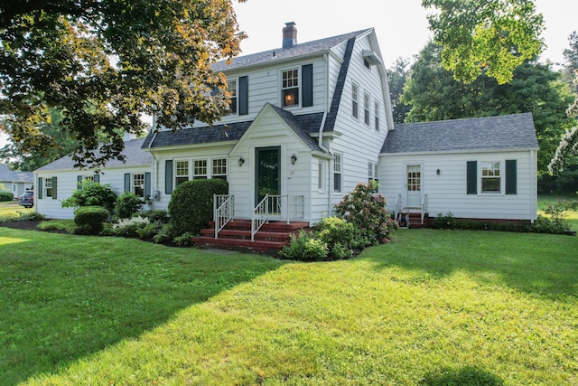 22 Spring Rd, North Haven, CT 06473 - view of front of property with a front lawn, a chimney, roof with shingles, and a gambrel roof