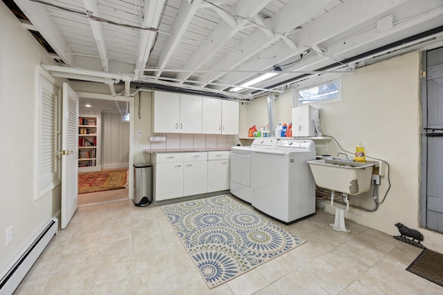 22 Spring Rd, North Haven, CT 06473 - washroom featuring baseboard heating, washing machine and clothes dryer, and cabinet space