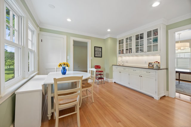 22 Spring Rd, North Haven, CT 06473 - dining room featuring light wood-style flooring, recessed lighting, and crown molding