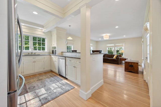 22 Spring Rd, North Haven, CT 06473 - kitchen featuring appliances with stainless steel finishes, light wood-style flooring, open floor plan, recessed lighting, and pendant lighting