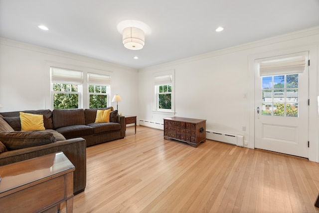22 Spring Rd, North Haven, CT 06473 - living area with a baseboard heating unit, plenty of natural light, light wood-style floors, crown molding, and recessed lighting