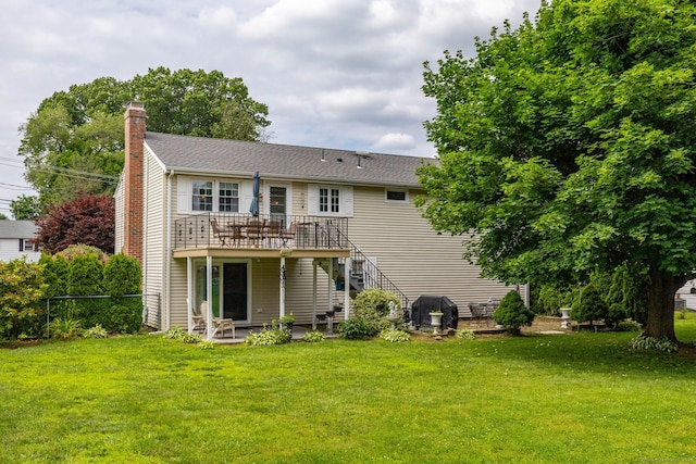 100 Chestnut Rd, Newington, CT 06111 - back of house with a deck, stairs, a chimney, and a patio