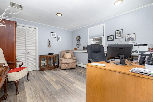 100 Chestnut Rd, Newington, CT 06111 - home office featuring light wood finished floors, ornamental molding, and a baseboard radiator