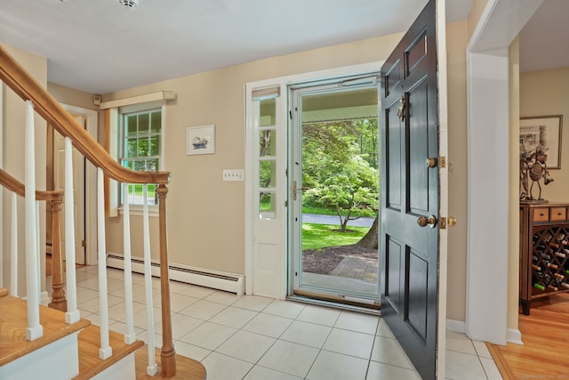 14 Inverness Rd, Trumbull, CT 06611 - foyer entrance featuring baseboard heating, stairs, and light tile patterned floors