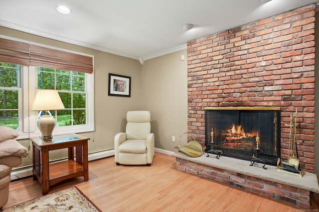 14 Inverness Rd, Trumbull, CT 06611 - living area with wood finished floors, ornamental molding, and a brick fireplace