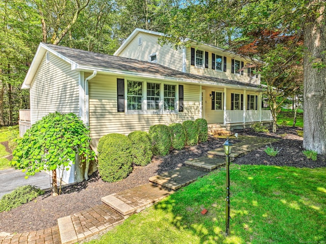 14 Inverness Rd, Trumbull, CT 06611 - traditional-style house featuring a porch and a front lawn