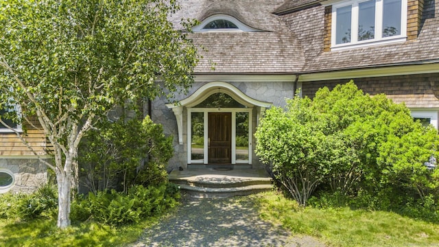 1410 S Pine Creek Rd, Fairfield, CT 06824 - doorway to property featuring stone siding