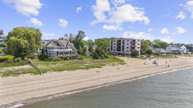 1410 S Pine Creek Rd, Fairfield, CT 06824 - view of subject property featuring waterfront with a beach