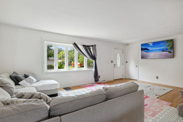 107 Carroll Rd, Hamden, CT 06517 - living area with light wood-type flooring and baseboards