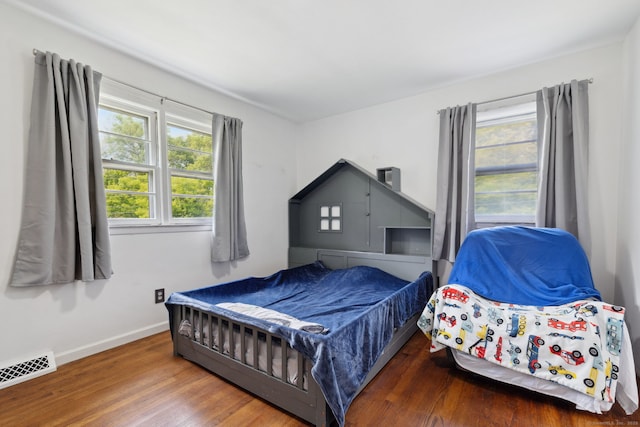 107 Carroll Rd, Hamden, CT 06517 - bedroom with baseboards and wood finished floors