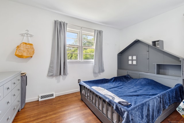 107 Carroll Rd, Hamden, CT 06517 - bedroom with wood finished floors and baseboards