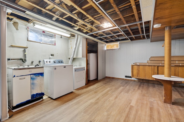 107 Carroll Rd, Hamden, CT 06517 - laundry area with independent washer and dryer and light wood finished floors