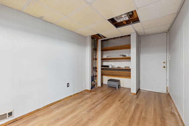 107 Carroll Rd, Hamden, CT 06517 - finished basement featuring wood finished floors and a drop ceiling