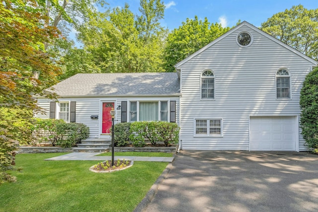 123 Knapp St, Stamford, CT 06907 - view of front of house with a front yard, driveway, a garage, and a shingled roof