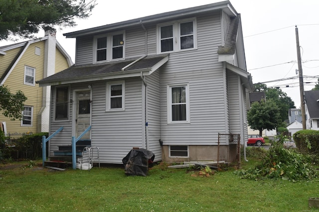 190 Victoria Rd, Hartford, CT 06114 - back of property featuring a yard, entry steps, and a shingled roof