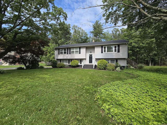 77 Hartz Ln, East Hartford, CT 06118 - bi-level home featuring a front lawn