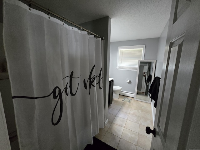 77 Hartz Ln, East Hartford, CT 06118 - full bathroom with a baseboard radiator, tile patterned flooring, curtained shower, and a textured ceiling