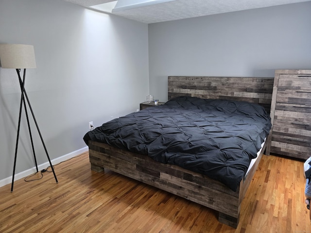 77 Hartz Ln, East Hartford, CT 06118 - bedroom featuring wood finished floors and baseboards