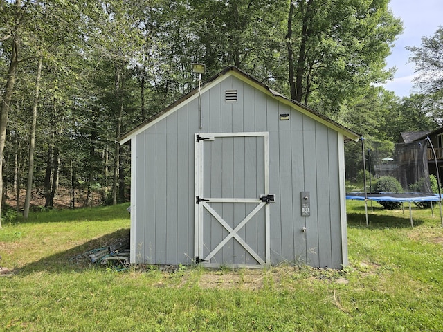 77 Hartz Ln, East Hartford, CT 06118 - view of shed with a trampoline