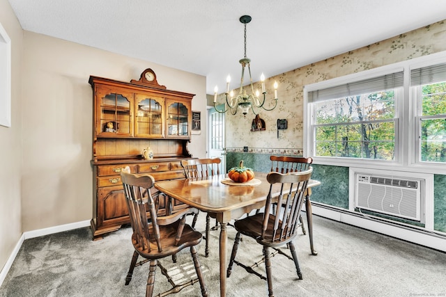 46 Jackson Rd, Enfield, CT 06082 - dining space with plenty of natural light, a chandelier, light colored carpet, a wall unit AC, and wallpapered walls