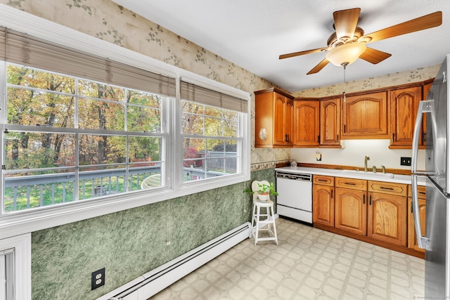 46 Jackson Rd, Enfield, CT 06082 - kitchen with dishwasher, light floors, freestanding refrigerator, wallpapered walls, and baseboard heating