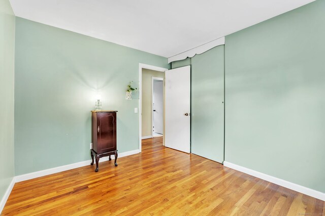 46 Jackson Rd, Enfield, CT 06082 - unfurnished bedroom with light wood-type flooring
