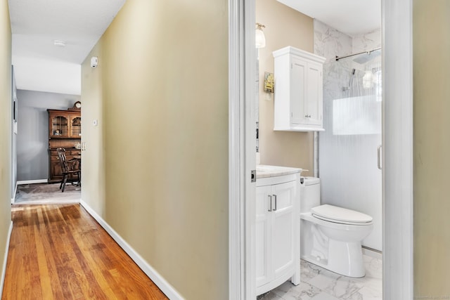 46 Jackson Rd, Enfield, CT 06082 - bathroom featuring a shower stall, vanity, and marble look tile flooring